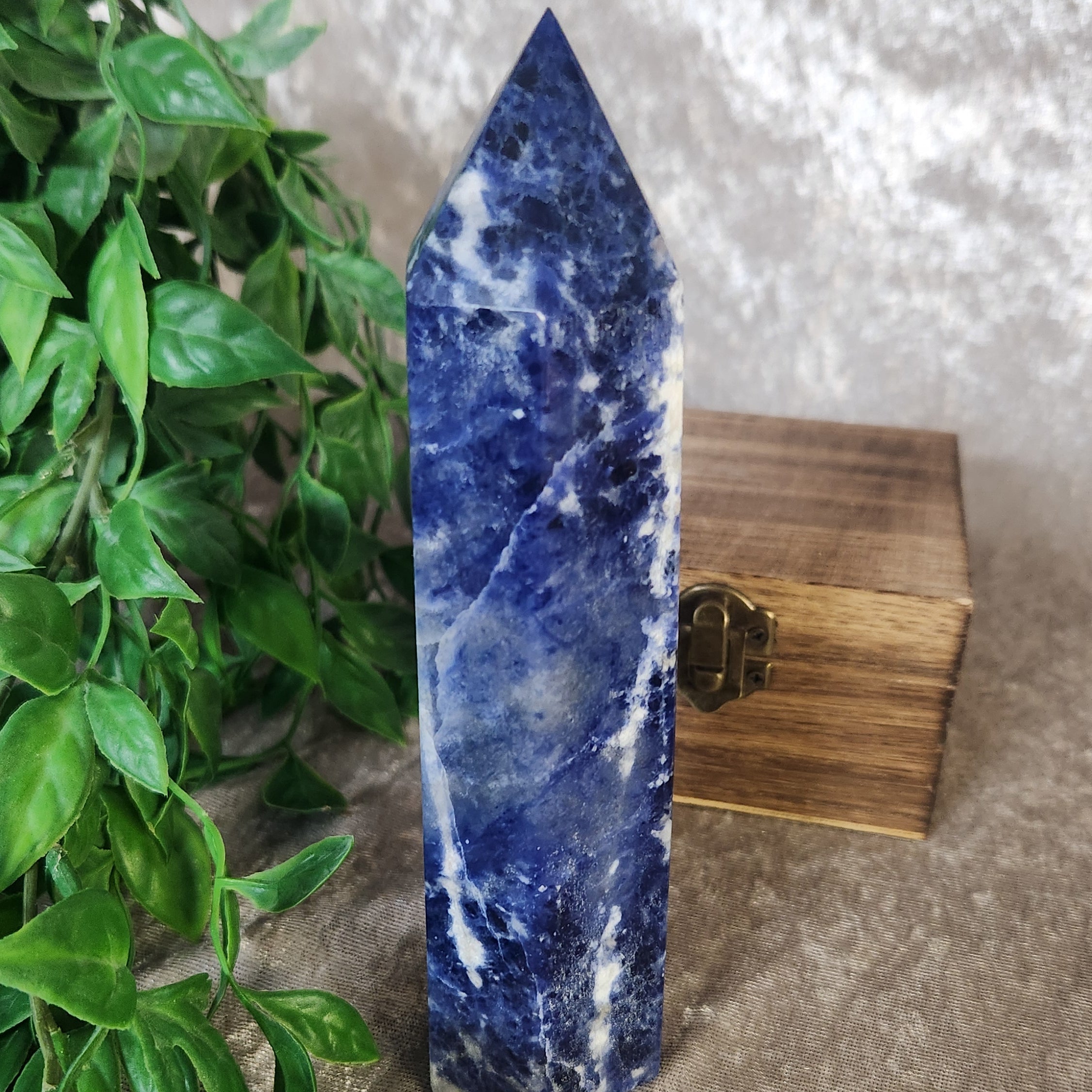Polished sodalite tower showcasing natural marbled patterns