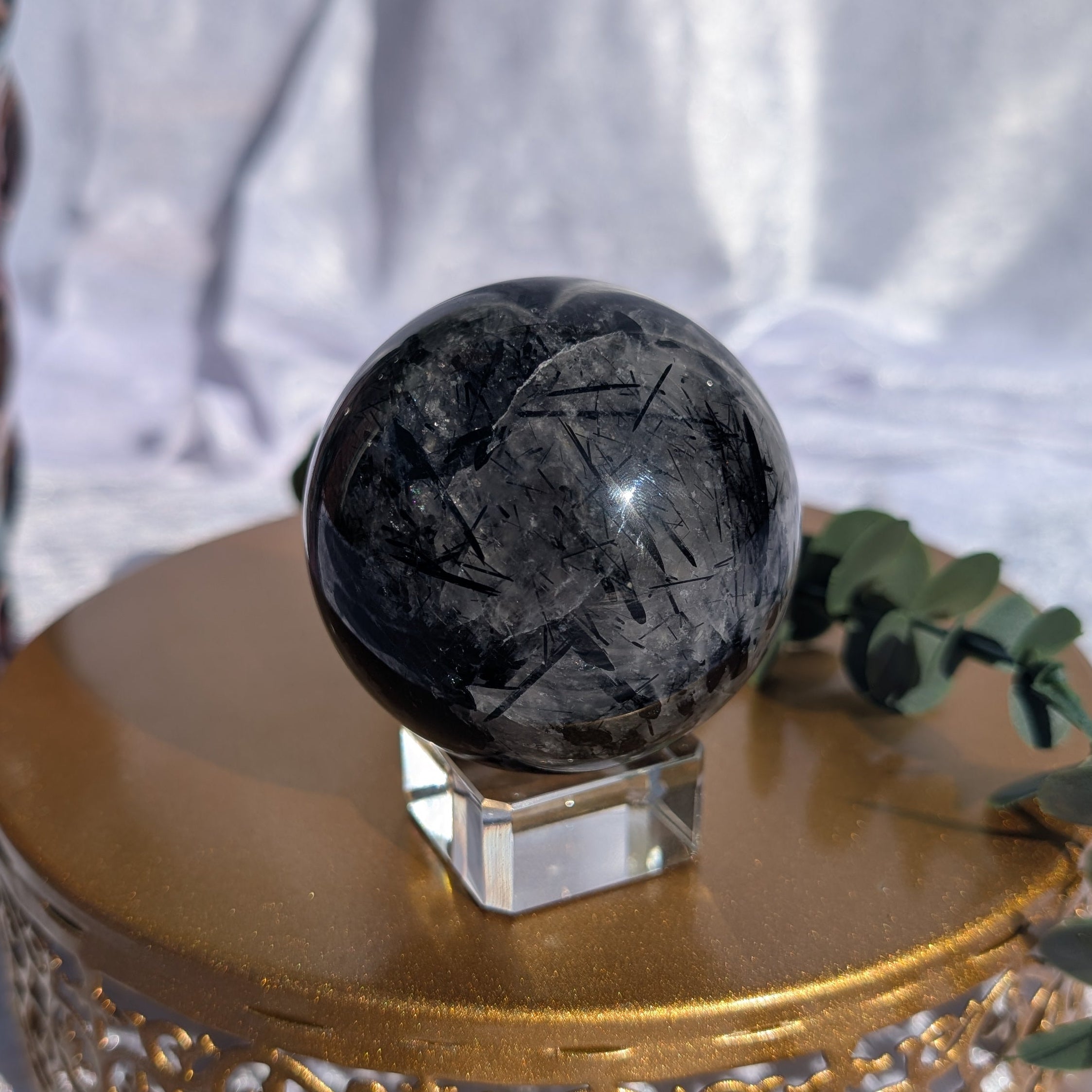 Grounding Tourmalinated Quartz sphere with smoky and clear quartz tones